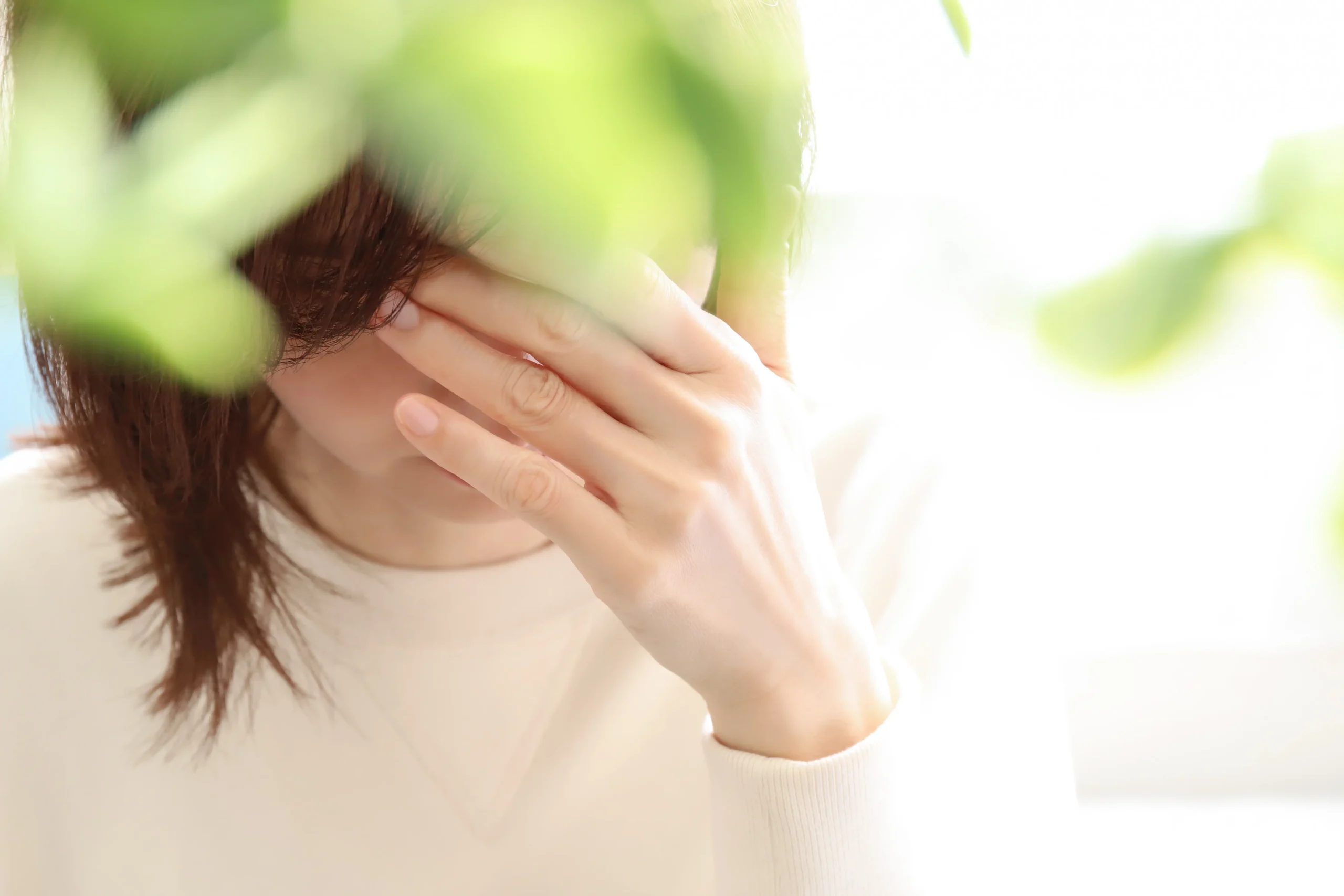 体調の悪い女性